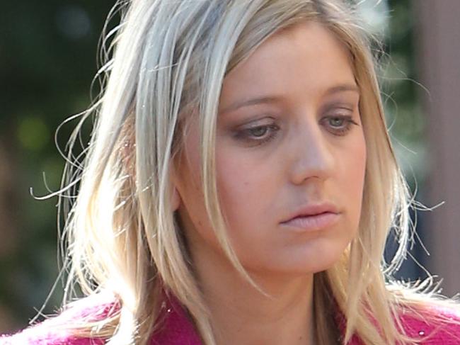 Journo from Chan 9 Alex Bernhardt after cigarette brushed her face ,Associates abusing media after sentenceing at Court appearance for Stevee Kennedy who allegedly stabbed her former partner Freeman Brookes in Caboolture on Saturday night..Pic Annette Dew