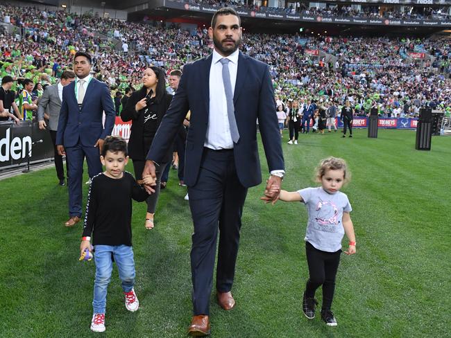 Greg Inglis with his kids in the lap of honour for retiring players during the 2019 NRL Grand Final between the Canberra Raiders and the Sydney Roosters. Picture: AAP