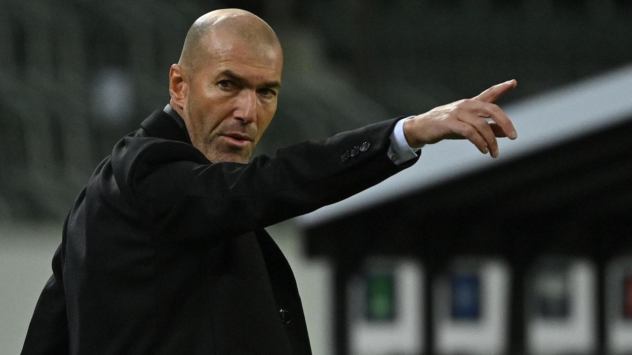 (FILES) In this file photo taken on October 27, 2020 Real Madrid's French coach Zinedine Zidane reacts from the sidelines during the UEFA Champions League group B football match Borussia Moenchengladbach v Real Madrid in Moenchengladbach, western Germany on October 27, 2020. - Zinedine Zidane resigned as Real Madrid manager because he felt the Spanish club no longer had any faith in him, he wrote in an open letter on May 31, 2021. (Photo by Ina Fassbender / AFP)
