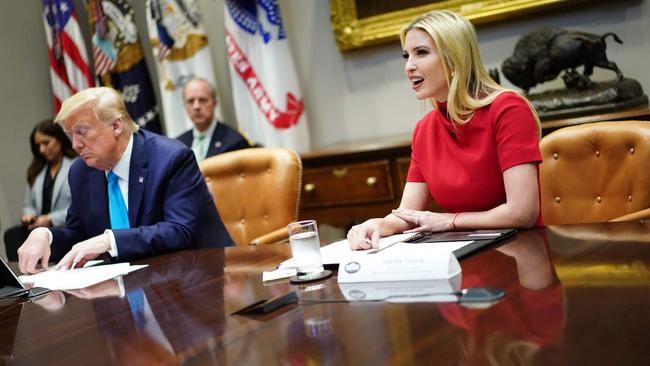 US President Donald Trump listens as senior adviser Ivanka Trump speaks at the White House on small business relief during the coronavirus crisis. Picture: AFP