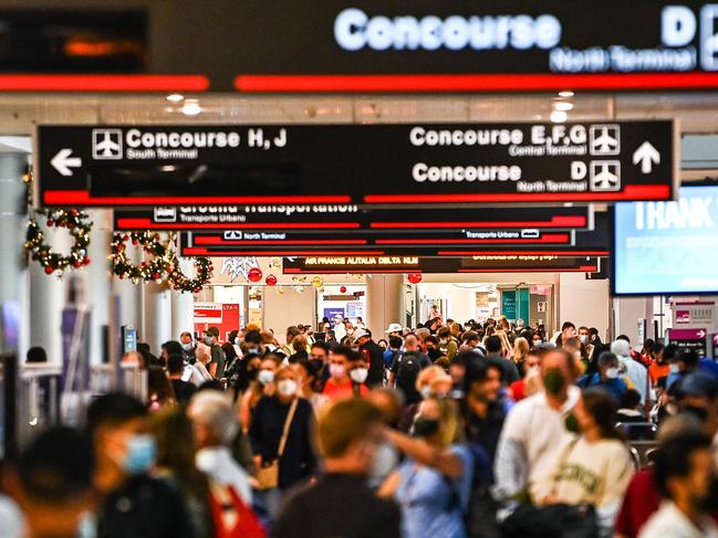 People are seen at the Miami International Airport in Miami, Florida. Picture: AFP