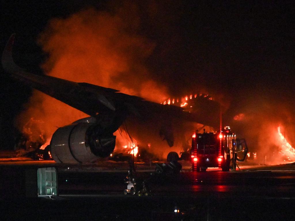 Five crew members on board the coast guard plane died – the pilot escaped. Everyone on the JAL flight escaped. Picture: AFP