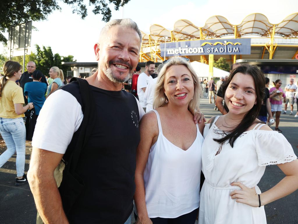 Daniel, Kim and Savannah Barrios arrive at Metricon Stadium to see Queen Live. Photograph: Jason O'Brien