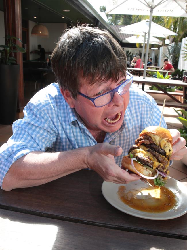 Before; Liverpool Leader editor Campbell Cooney, full of optimism at Goodtime Burgers before attempting to eat the Juggernaut burger.