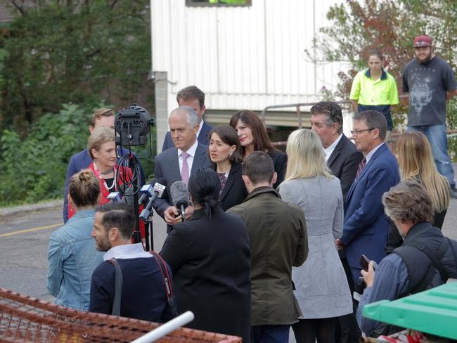 A crowd of media gathered for the visit