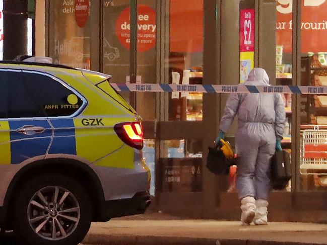 A police forensic officer working near the scene of the stabbing incident in Streatham, London. Picture: Alastair Grant