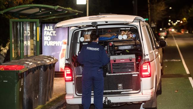 Forensic police at a first floor apartment on Kooyong Road, Gardenvale. Picture: Jason Edwards