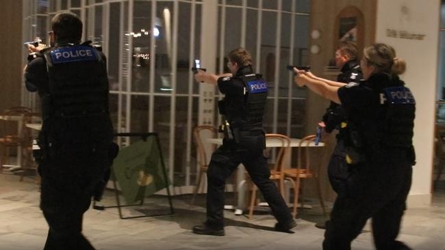 Officers at Coomera Westfield shopping centre taking part in the counterterrorism training. Picture: Queensland Police Service.