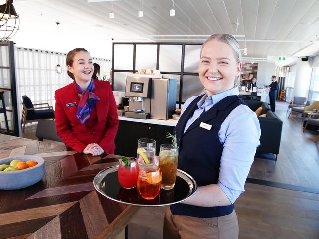 Samara Jensen and Tayla Pleszkun pose at the opening of My Lounge by Virgin Australia at Brisbane International Airport on Wednesday, September 4, 2019. (AAP Image/Claudia Baxter)