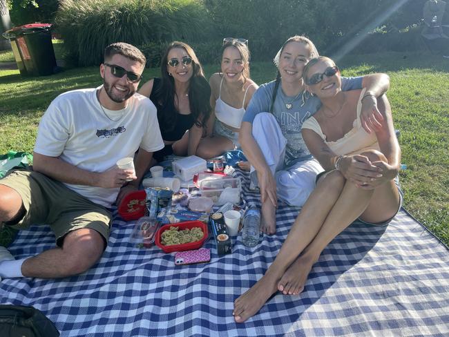 Cain, Sarah, Brianna, Emma and Ailbhe at Flagstaff Gardens in the Melbourne CBD for the 2024 New Year's Eve fireworks. Picture: Himangi Singh