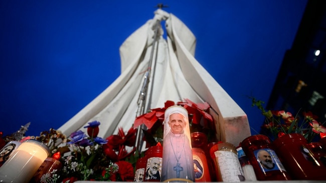 Candles outside the hospital where Francis is being treated. Picture: Filippo Monteforte/AFP