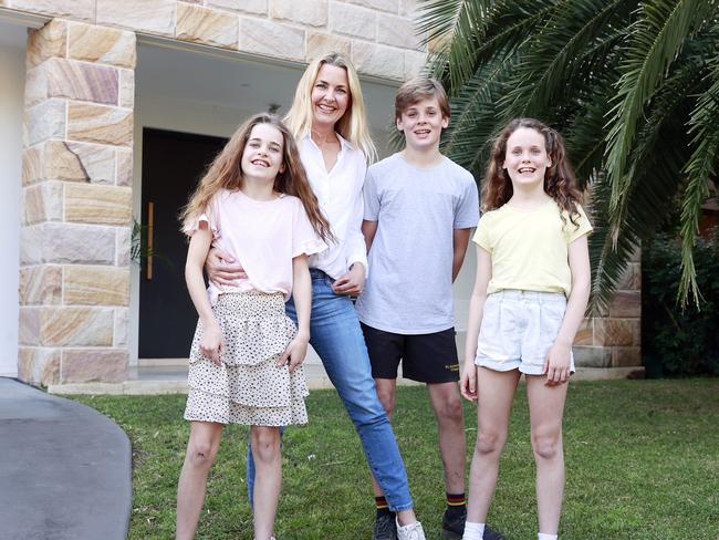 WEEKEND TELEGRAPHS SPECIAL. SEPTEMBER 1, 2022. PLEASE CONTACT WEEKEND PIC EDITOR JEFF DARMANIN BEFORE PUBLISHING.Pictured is Kristy Dunn with her kids Archer 12, Addie 10 and Heidi 8, at their home in North Manly which is on the market. Picture: Tim Hunter.