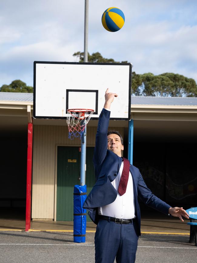 Education Minister Blair Boyer shoots his shot at Clovelly Park Primary School. Picture: NCA NewsWire / Morgan Sette