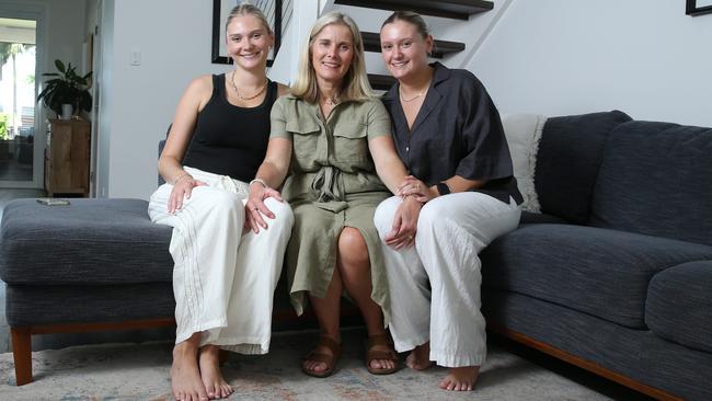 Candice Nable with her daughters Lily, 23, and Heidi, 21. The young women still live at home as the cost of housing makes it difficult for 20 somethings, even those in full-time jobs, to manage a place to live. Picture: Britta Campion/The Australian