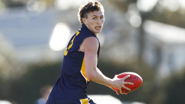 Zac Schafer of Whitefriars College runs with the ball. Picture: Daniel Pockett/AFL Photos/via Getty Images