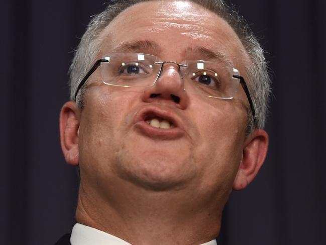Australia's Treasurer Scott Morrison speaks to the media during a press conference at Parliament House in Canberra, Monday, Dec. 19, 2016. Australia's Treasurer Scott Morrison will hand down the Mid Year Economic and Fiscal Outlook (MYEFO). (AAP Image/Lukas Coch) NO ARCHIVING