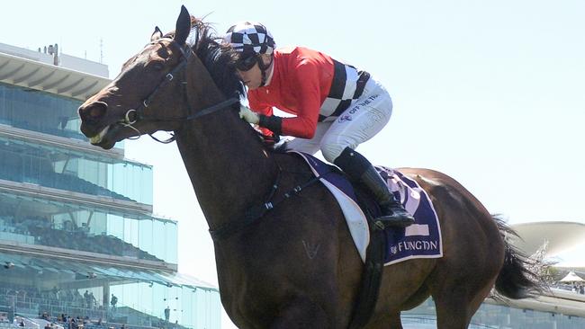 Revelare, ridden by Ryan Hurdle, wins at Flemington on Saturday. Picture: Brett Holburt / Racing Photos