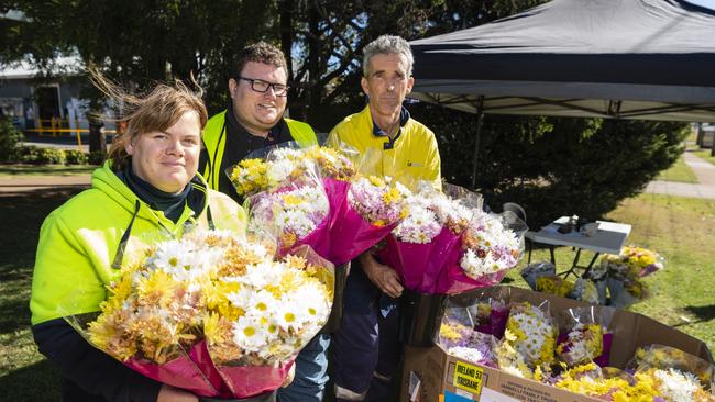 Working on the Endeavour Foundations Mother's Day flower sale are (from left) Bianca, Andrew and Ben on Thursday, May 11, 2023. Picture: Kevin Farmer