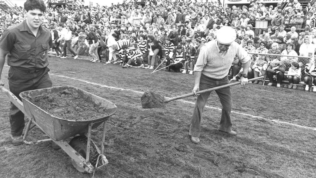 Kardinia Park ground staff repair the holes caused by the cars that carried the celebrities. 25/5/1986 Geelong Cats History