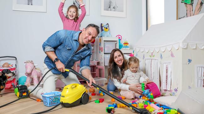 For SMARTdaily lead story. Many Australians have begun early spring cleaning in order to keep themselves entertained during lockdown. Action photos of Olga and Patrick Hemmerich and daughters Harper, 4 and Hazel, 2, doing cleaning at home. Picture: Tim Carrafa