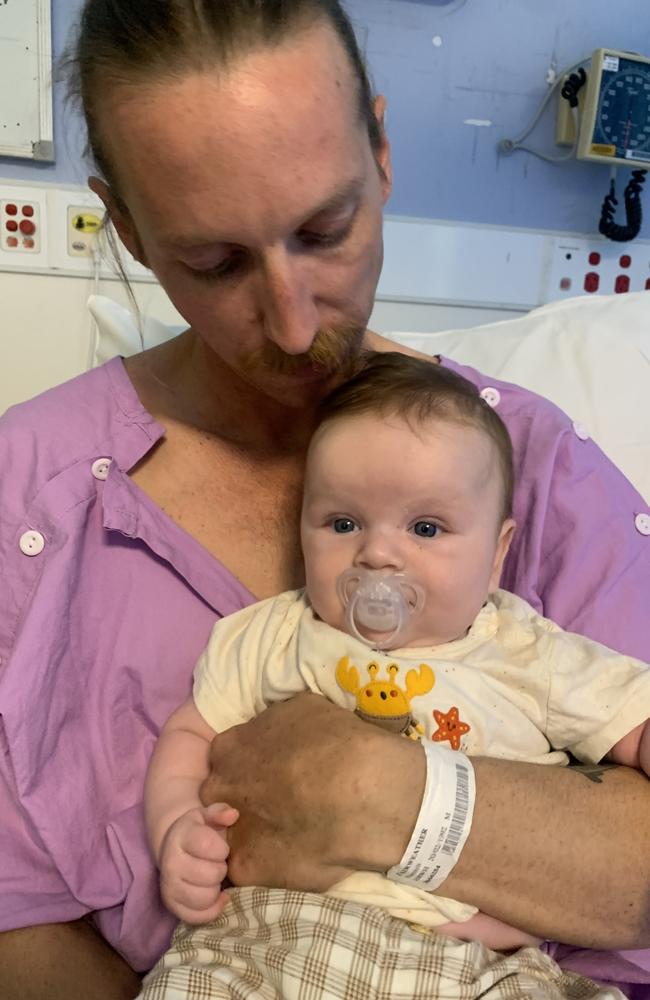 Hamish Fairweather with baby Miles in a Brisbane hospital.