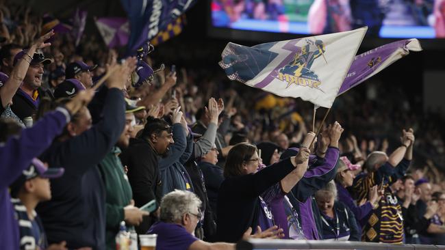 MELBOURNE, AUSTRALIA - AUGUST 24: Storm fans shot support during the round 25 NRL match between Melbourne Storm and Dolphins at AAMI Park, on August 24, 2024, in Melbourne, Australia. (Photo by Daniel Pockett/Getty Images)