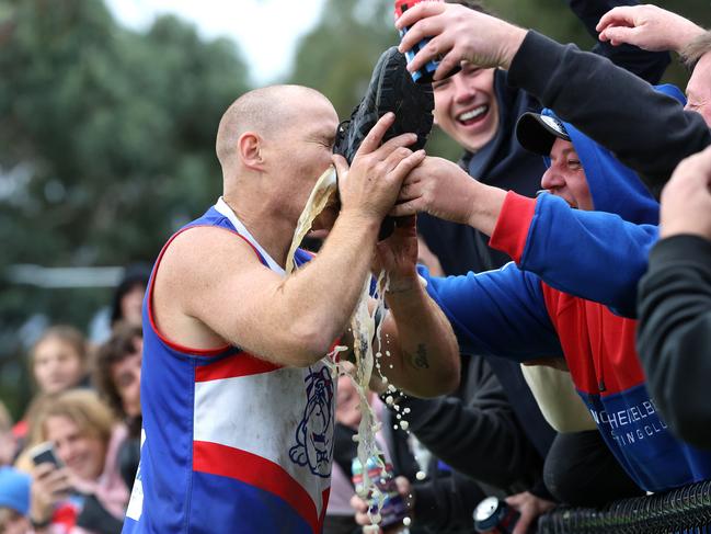 NFNL: North Heidelberg’s Shane Harvey drinks a shoey after his fifth goal. Picture: Hamish Blair