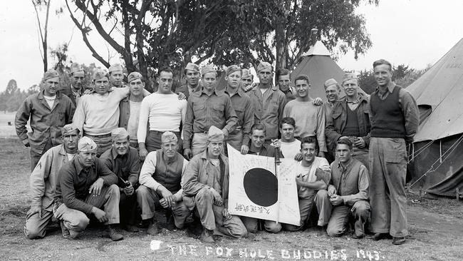 US Marines pose with battle trophies. Picture: Charles Edward Boyles, State Library of Victoria