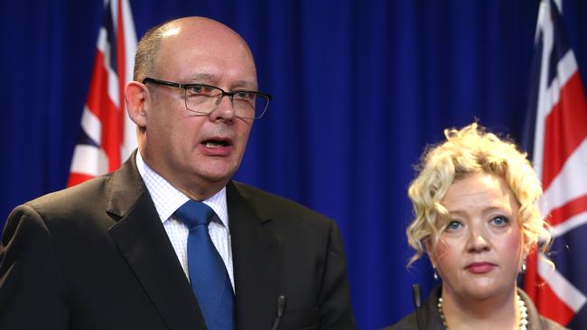 Dr John Ballard speaks, flanked by Minister Jill Hennessy on October 16, 2015. Picture: Hamish Blair