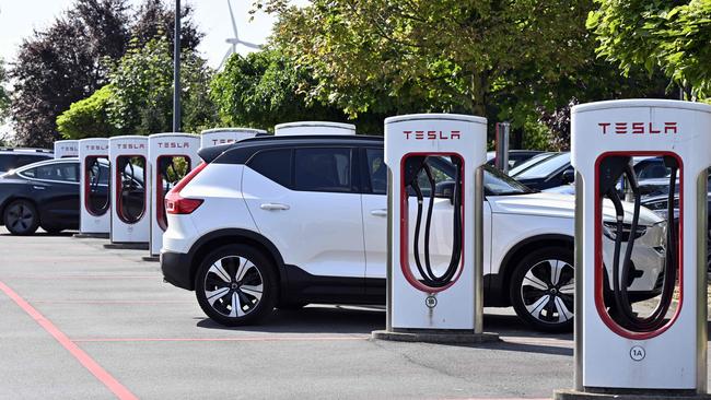 CBA reported a boom in electric and hybrid vehicle sales, as companies added new vehicles to their fleets. Picture: AFP