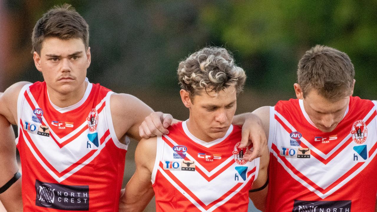 The Waratahs pay tribute to late, great ruckman Alexander ‘Rooch’ Aurrichio at the first game under lights at Gardens Oval. Picture: Aaron Black/AFLNT Media