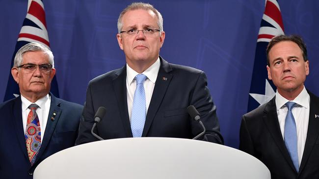 Prime Minister Scott Morrison, Aged Care Minister Ken Wyatt (left) and Health Minister Greg Hunt (right) announce the aged care royal commission in 2018. Picture: AAP Image/Joel Carrett