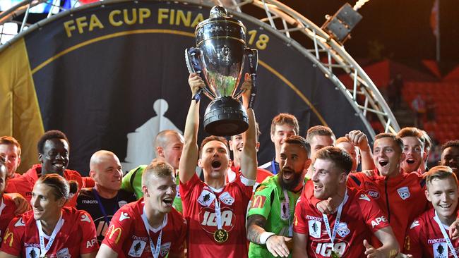 United players celebrate after winning the FFA Cup Final match between Adelaide United and Sydney FC at Coopers Stadium in Adelaide, Tuesday, October 30, 2018. (AAP Image/David Mariuz) NO ARCHIVING, EDITORIAL USE ONLY