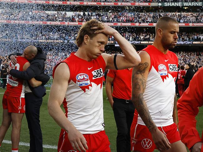 Sydney's Callum Mills and Lance Franklin look dejected after the 2022 AFL Grand Final between the Sydney Swans and Geelong Cats at the MCG on September 24, 2022. Photo by Phil Hillyard(Image Supplied for Editorial Use only - **NO ON SALES** - Â©Phil Hillyard )