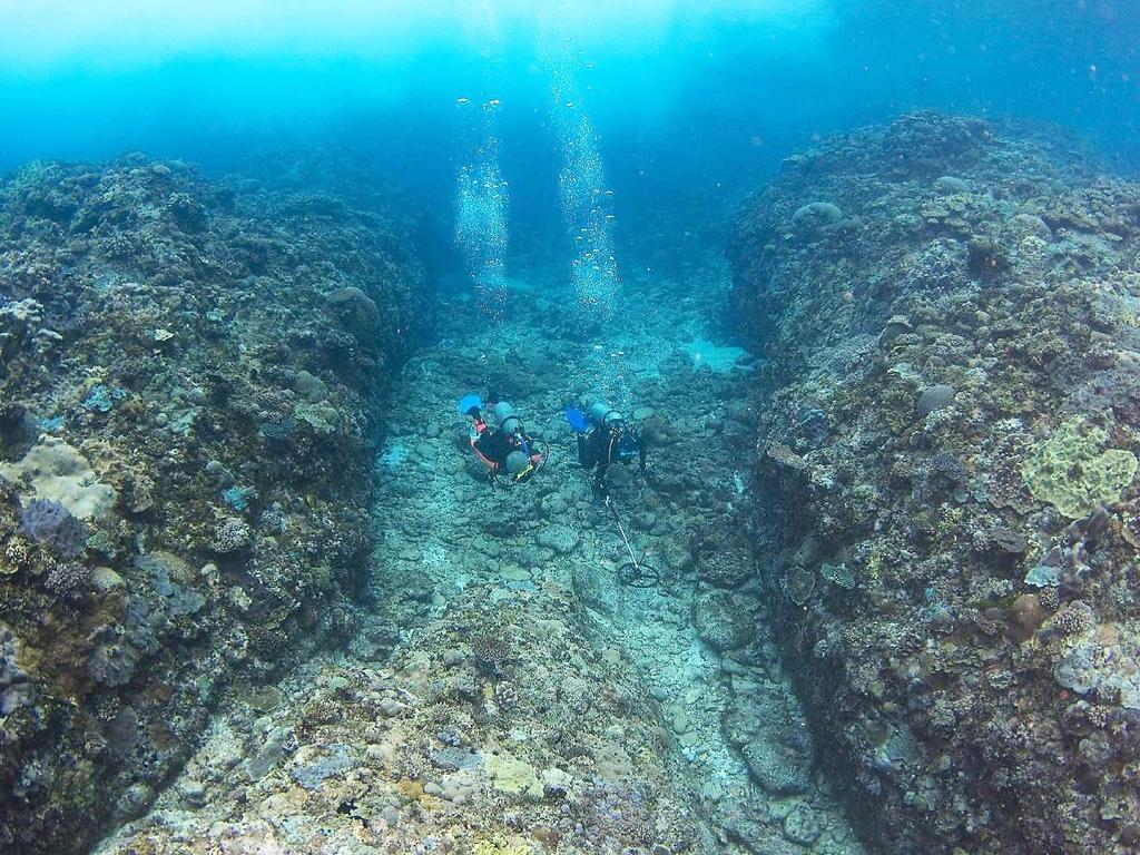 Two centuries on, the story still fascinates ... divers search Wreck Reef for the evidence of the Porpoise and Cato.