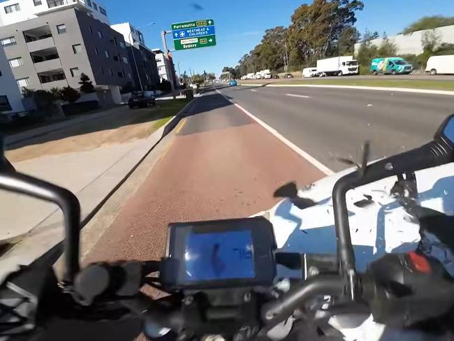 Uploaded to Facebook the footage has divided social media users with some arguing the rider was at fault. Picture: Facebook / Dash Cam Owners Australia