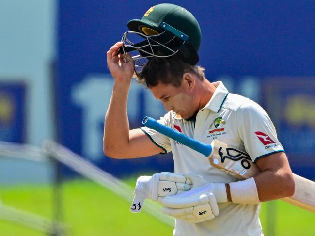 Australia's Marnus Labuschagne walks back to the pavilion after his dismissal during the second day of second test cricket match between Australia and Sri Lanka at the Galle International Cricket Stadium in Galle on February 7, 2025. (Photo by Ishara S. KODIKARA / AFP)