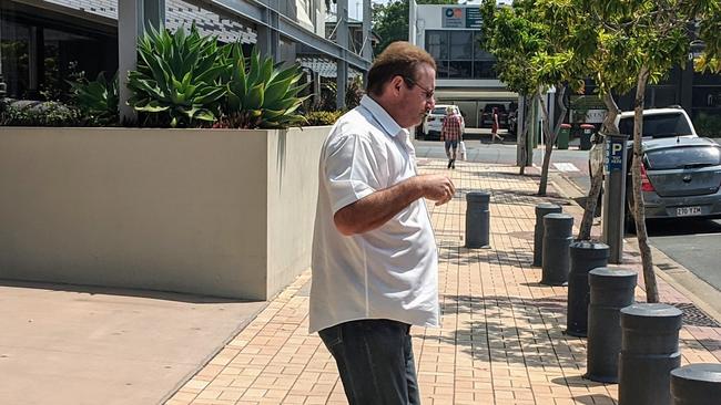 Kent Paul Scarborough, rushes from Southport Courthouse into a waiting car on Friday, November 15, 2019. Picture: Luke Mortimer