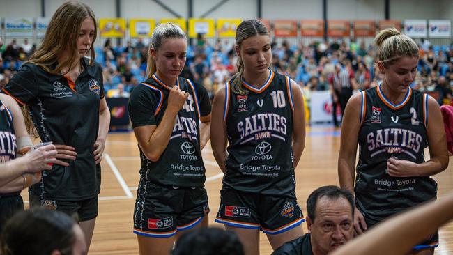 Darwin Salties women's coach Rod Tremlett leads his team at a break against Cairns Dolphins. Picture: Pema Pakhrin.