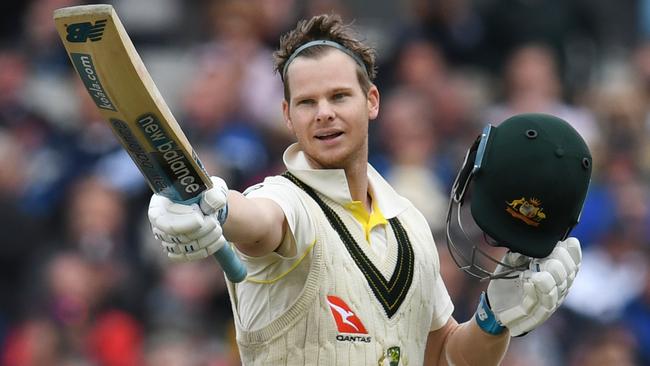 Steve Smith salutes the crowd at Old Trafford after reaching his 26th Test century and third in four innings this Ashes series. Picture: Getty Images