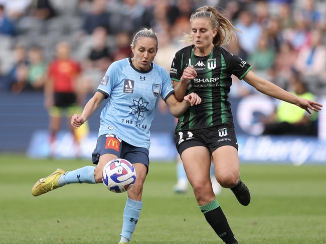 Sydney FC’s Mackenzie Hawkesby competes for the ball with Robers during last year’s Grand Final. Picture: Mark Kolbe/Getty Images