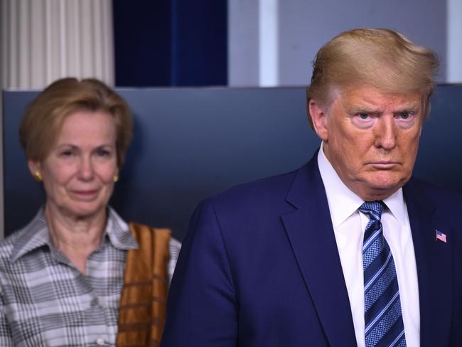 Response coordinator for the White House Coronavirus Task Force Deborah Birx and Mr Trump. Picture: AFP