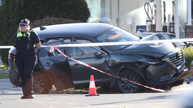 Police have cordoned off the site where a car, believed to belong to the shooter, crashed. Picture: David Crosling