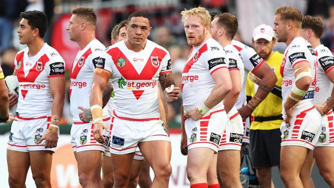 Dragons players look on after a Bulldogs try. Picture: Brett Costello