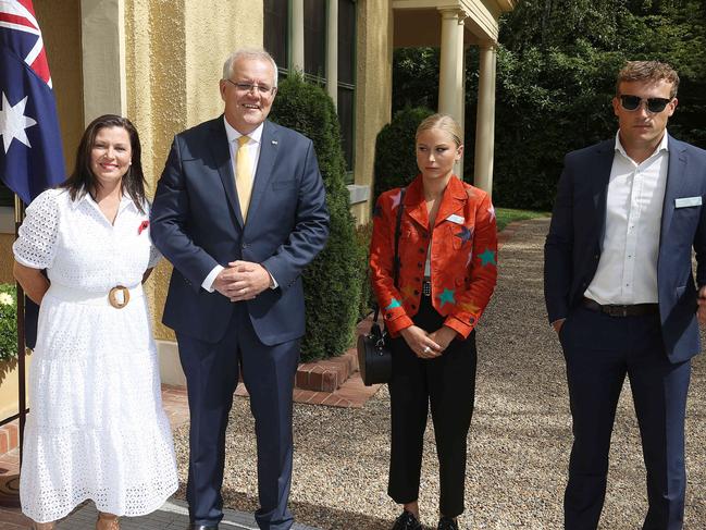 Prime Minister Scott Morrison and his wife Jenny with Grace Tame, who appeared to be uncomfortable with the meeting. The PM spoke with at the 2022 Australian of the Year Finalists Morning Tea, at the Lodge in Canberra. Picture: Gary Ramage