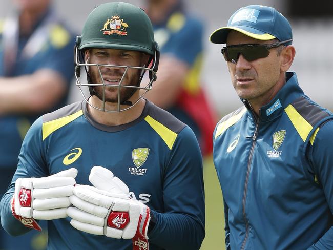 LONDON, ENGLAND - AUGUST 11: Australian cricketer David Warner and Coach Justin Langer talk to each other during The Australia Net Session at Lord's Cricket Ground on August 11, 2019 in London, England. (Photo by Luke Walker/Getty Images)