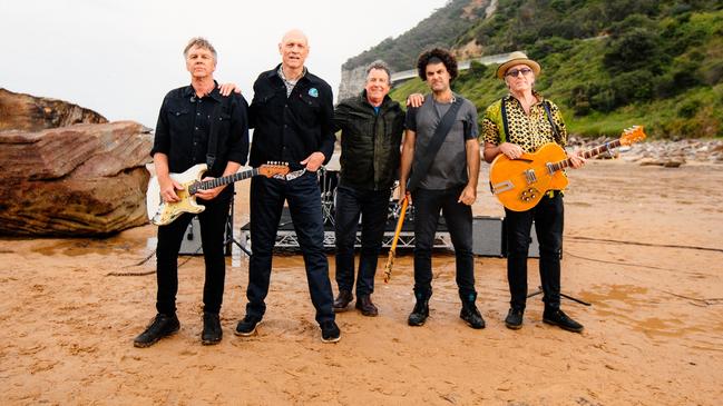 Sydney rock band Midnight Oil at Coalcliff, NSW while filming a performance for The Sound. L-R: Martin Rotsey, Peter Garrett, Rob Hirst, Adam Ventoura, Jim Moginie. Picture: Jess Gleeson