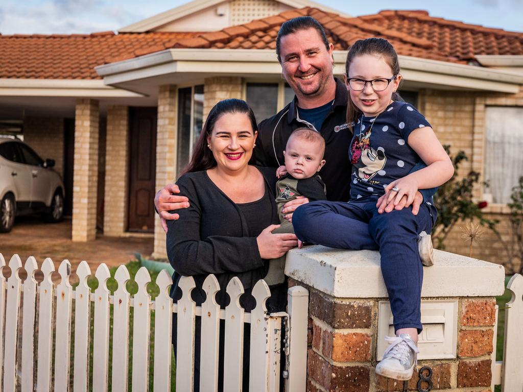 Ben and wife Elise Keeler with their children, Arabella and Luka at their rental property in Helena Valley near Perth. Picture: Tony McDonough.