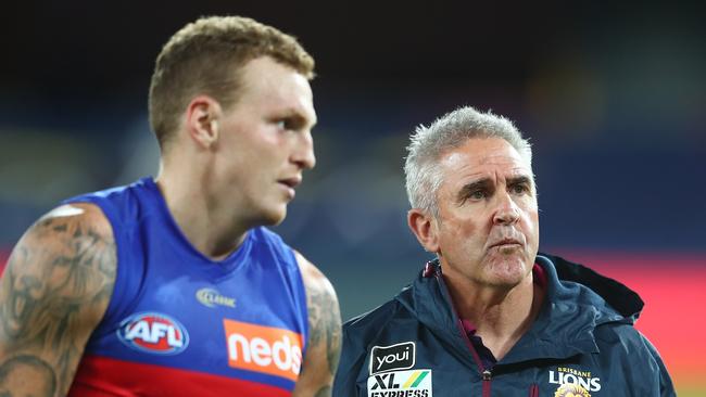 Lions head coach Chris Fagan talks to Mitch Robinson after Brisbane’s win over Melbourne on the Gold Coast on Sunday night. Picture: Getty Images