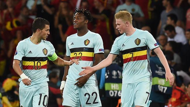 Belgium's forward Eden Hazard (L) forward Michy Batshuayi and midfielder Kevin De Bruyne